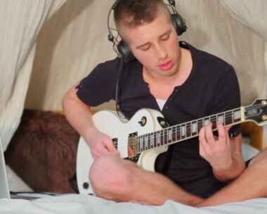 Electric guitar with headphones